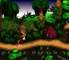 Donkey Kong Country – Dschungel-Level. Donkey Kong hält Fass über sich.